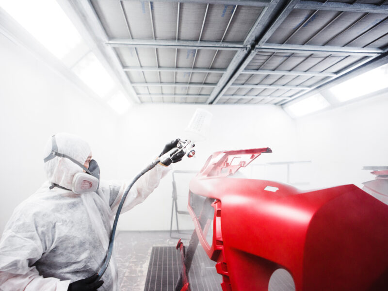 Car,Painter,Sprays,Varnish,In,Paint,Booth. Car,Painter,Sprays,Varnish,In,Paint,Booth.